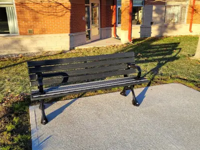 Bench on concrete pad outside of Grandview Lodge