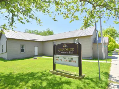 Front Exterior View Of Cheapside Community Hall With Sign