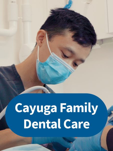 Cayuga Family Dental Care dentist doing dental work